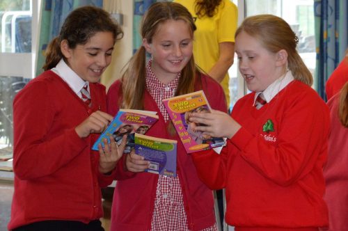 Girls enjoying books